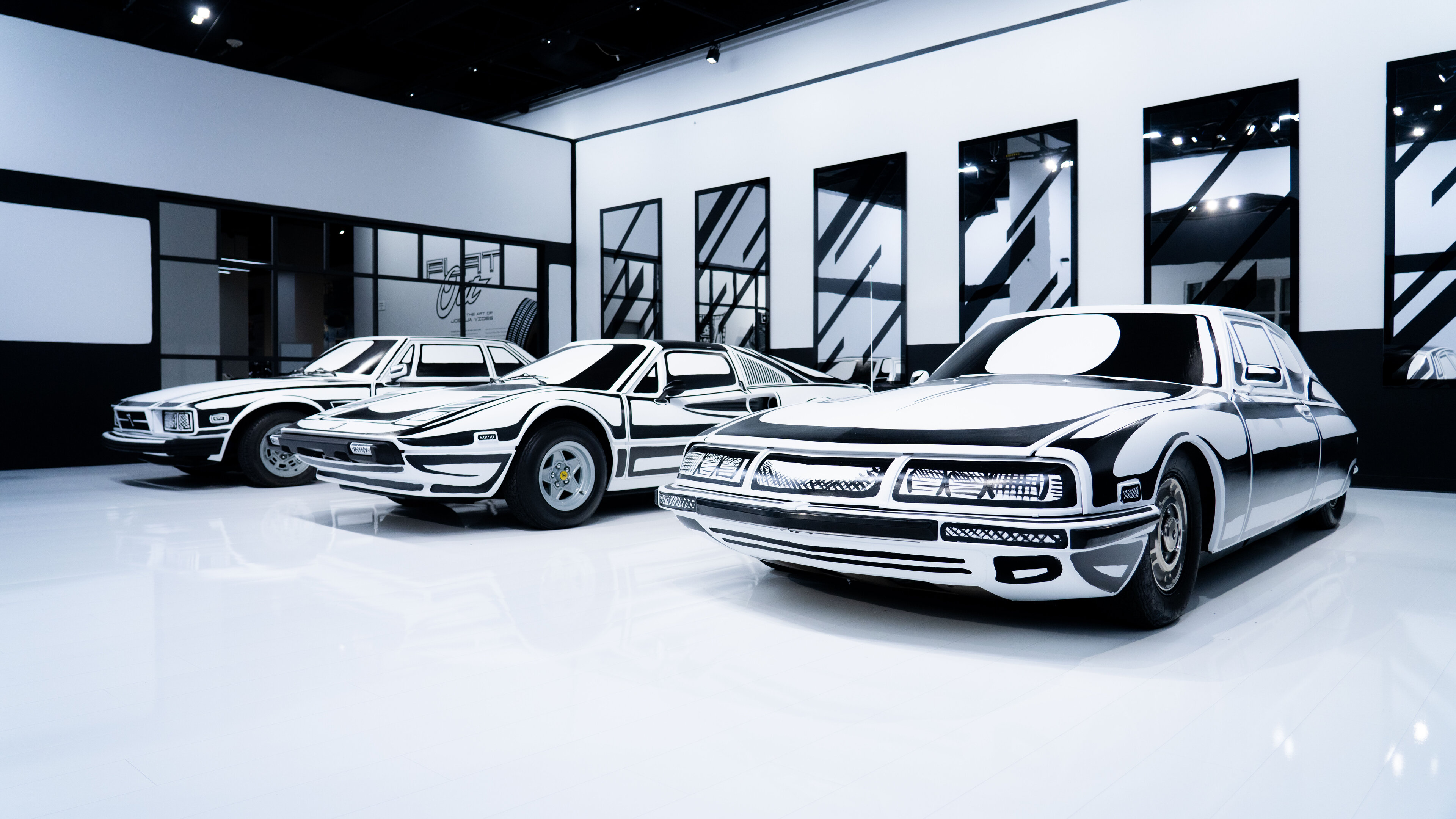 An artist has hand-painted classic cars to look like 2D comic book
