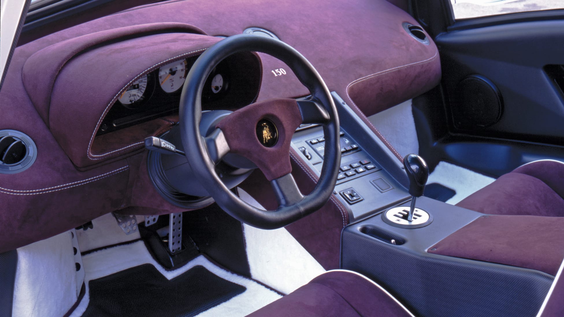 Yikes! It's a Aventador in Diablo purple Top Gear