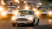 an_aston_martin_db4_gt_leads_the_field_as_a_two_ferrari_250_gt_swbs_jostle_for_second_place_by_drew_gibson.jpg