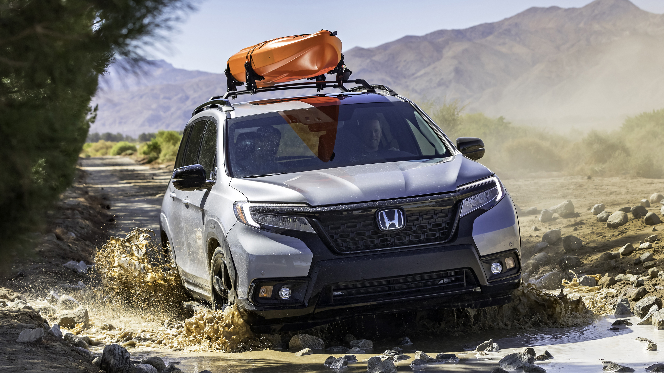 05_2019_honda_passport_with_accessory_roof_rack_running_boards_and_fender_flares.jpg