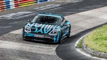 high_taycan_prototype_in_the_karussell_section_nurburgring_nordschleife_2019_porsche_ag.jpg