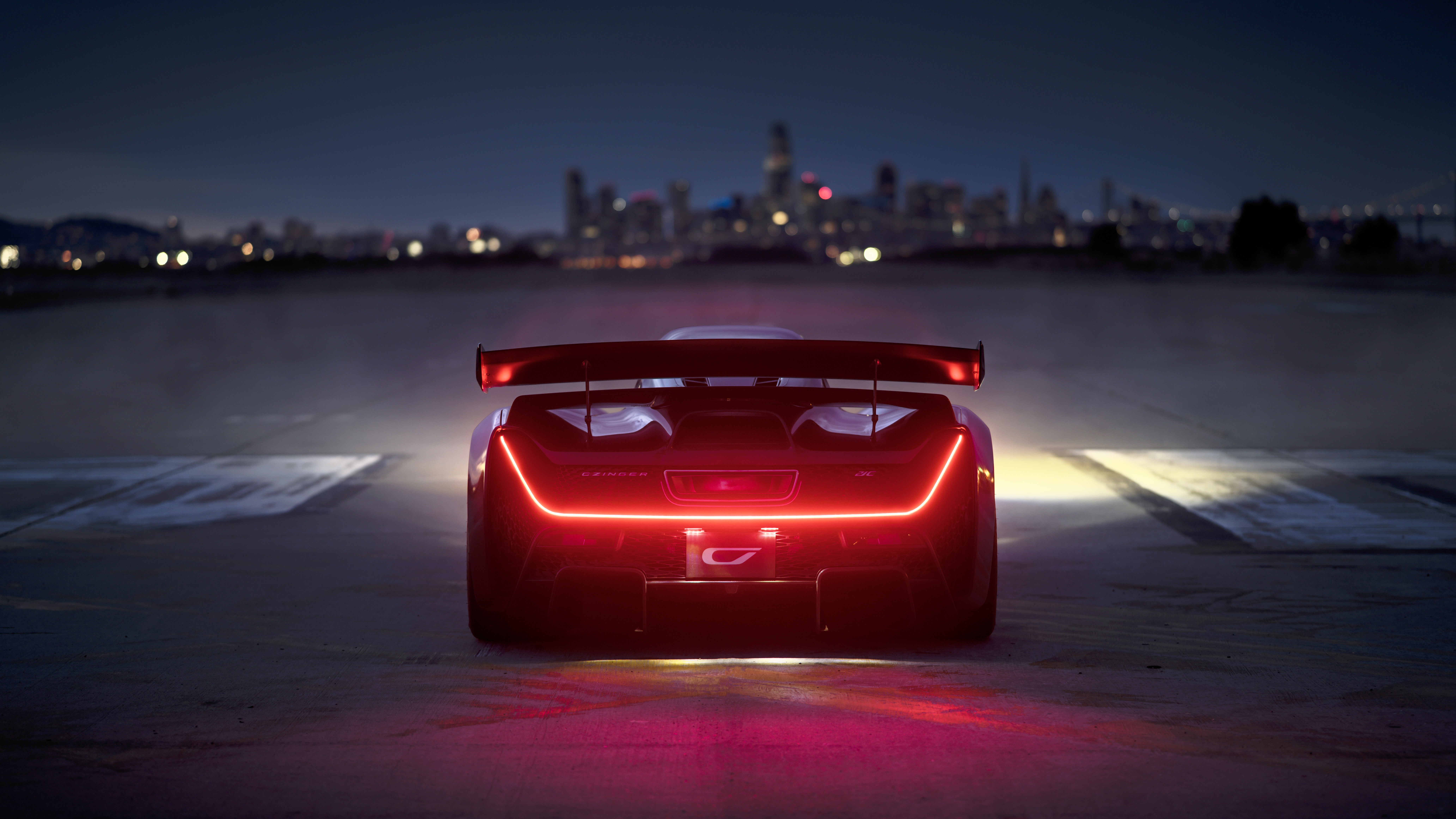 4._czinger_teases_21cs_advanced_aerodynamics_at_night_on_alameda_runway.jpg