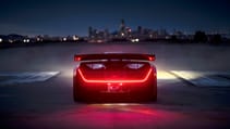 4._czinger_teases_21cs_advanced_aerodynamics_at_night_on_alameda_runway.jpg