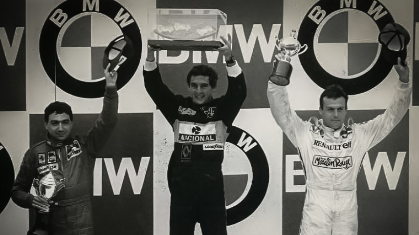 the_estoril_gp_podium_1985_l-r_michele_alboreto_ayrton_senna_patrick_tambay_credit_classic_team_lotus.jpg