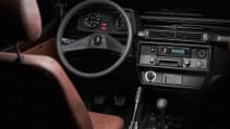 expedition-motor-company-rubellite-red-wolf-dashboard-close-up.jpg