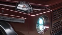 expedition-motor-company-rubellite-red-wolf-front-head-light-close-up-night-time.jpg