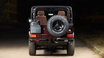 expedition-motor-company-rubellite-red-wolf-rear-view-night-time.jpg