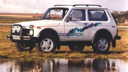 4x4 car tackling waterlogged field