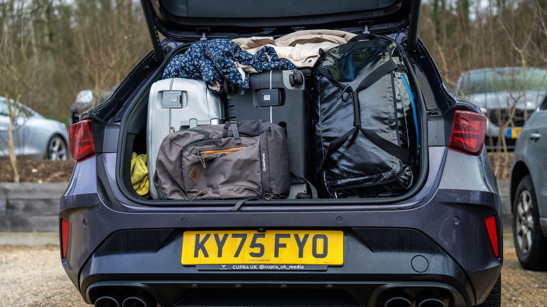 Cupra Leon Estate VZ1 pictured with it's boot open and luggage packed inside