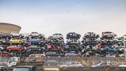 Cars stacked in a recycling centre used by eBay motoring