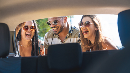 Three people laughing