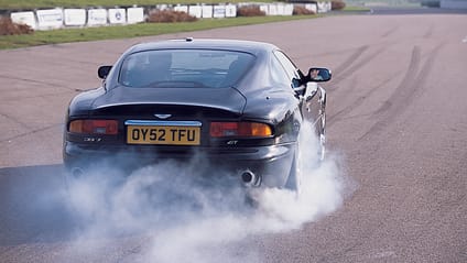 Mazda 323F rear lights on the Aston Martin DB7