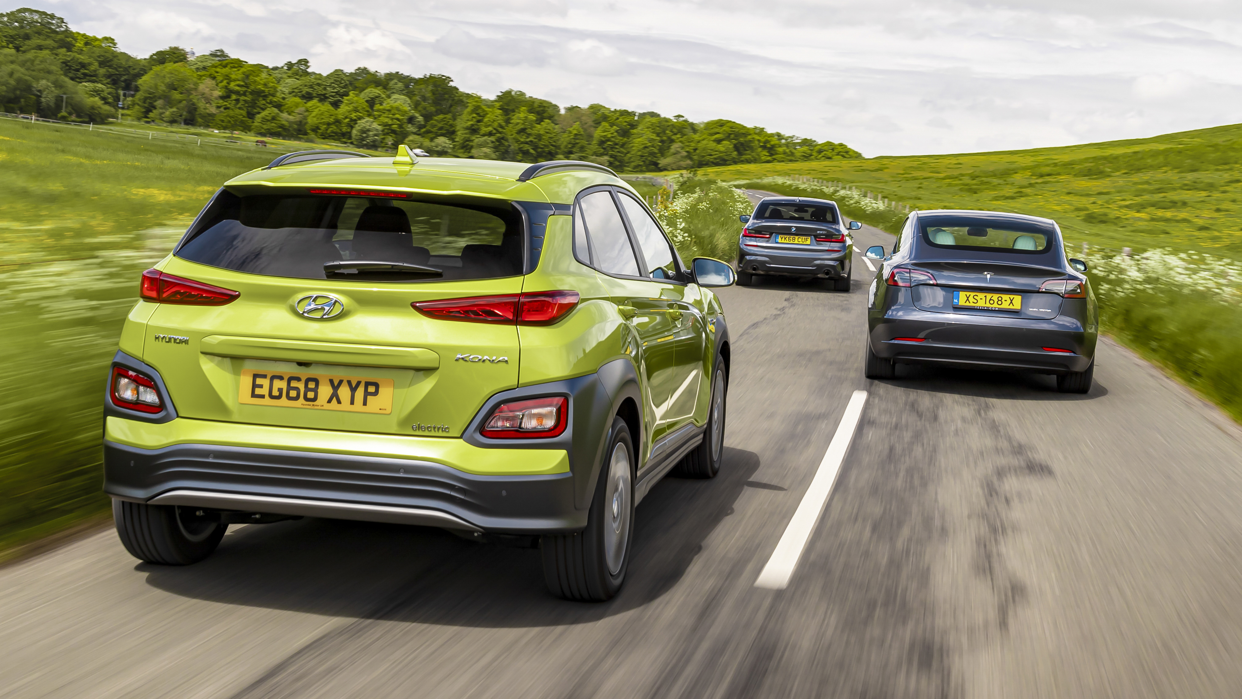 Tesla 3 vs hyundai kona electric sale
