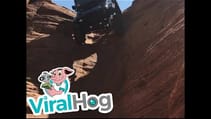 Jeep Drives Down Vertical Chute || ViralHog
